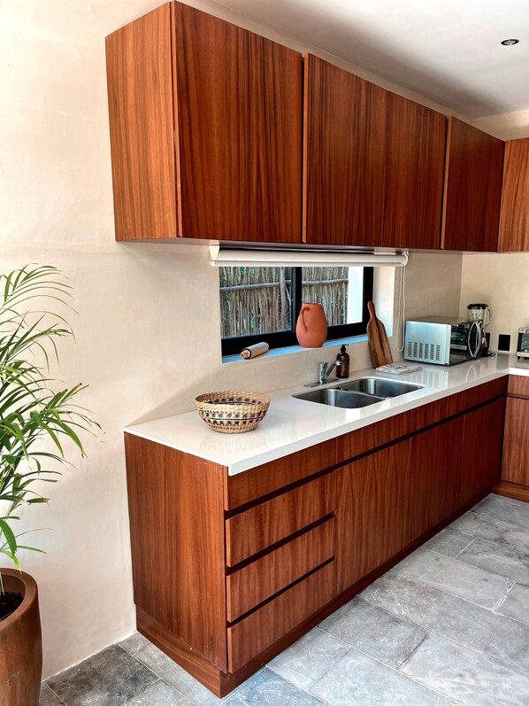 Fridge, microwave, stovetop, coffee/tea maker