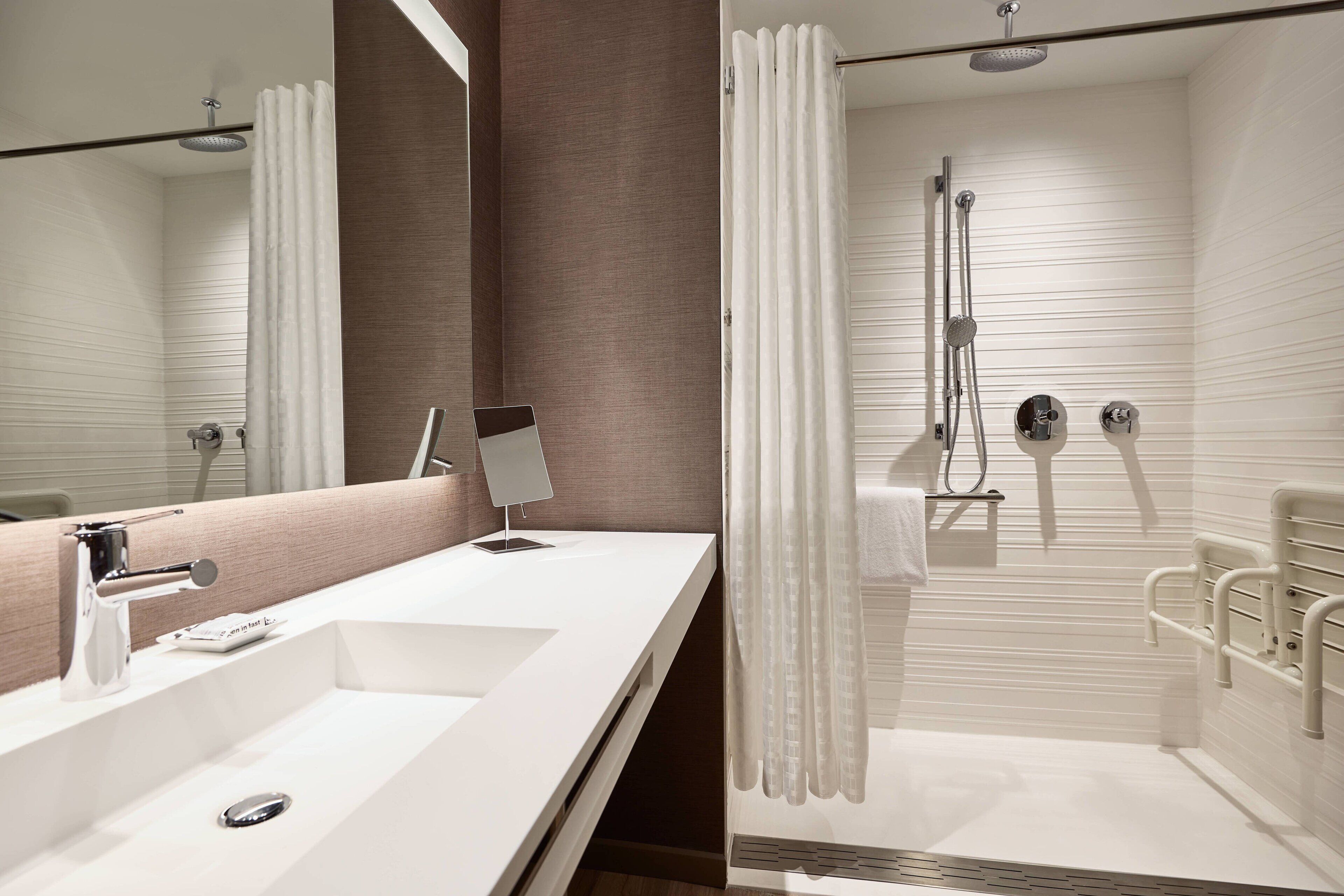 rainfall showerhead, free toiletries, hair dryer, towels