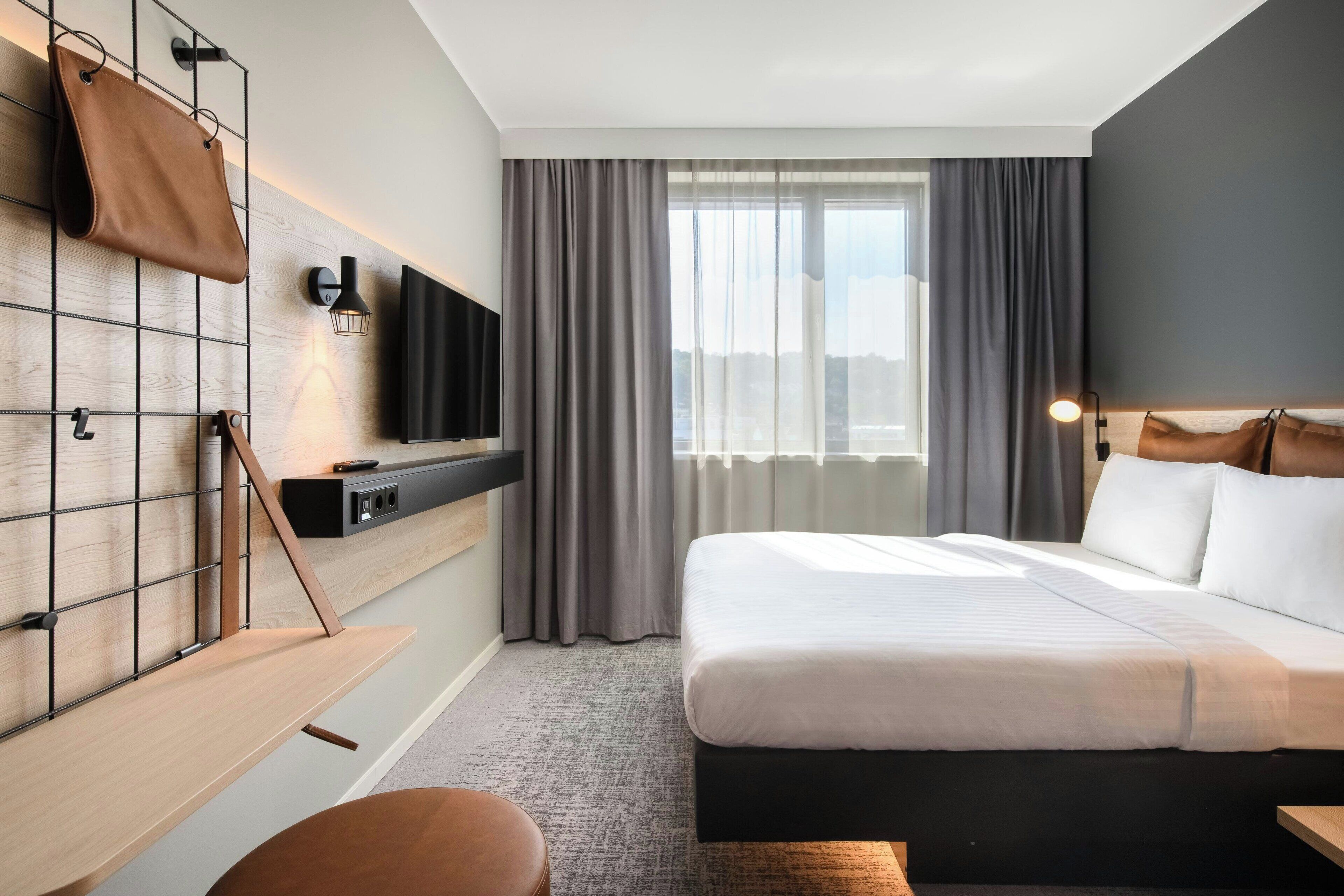 premium bedding, down duvets, desk, blackout curtains