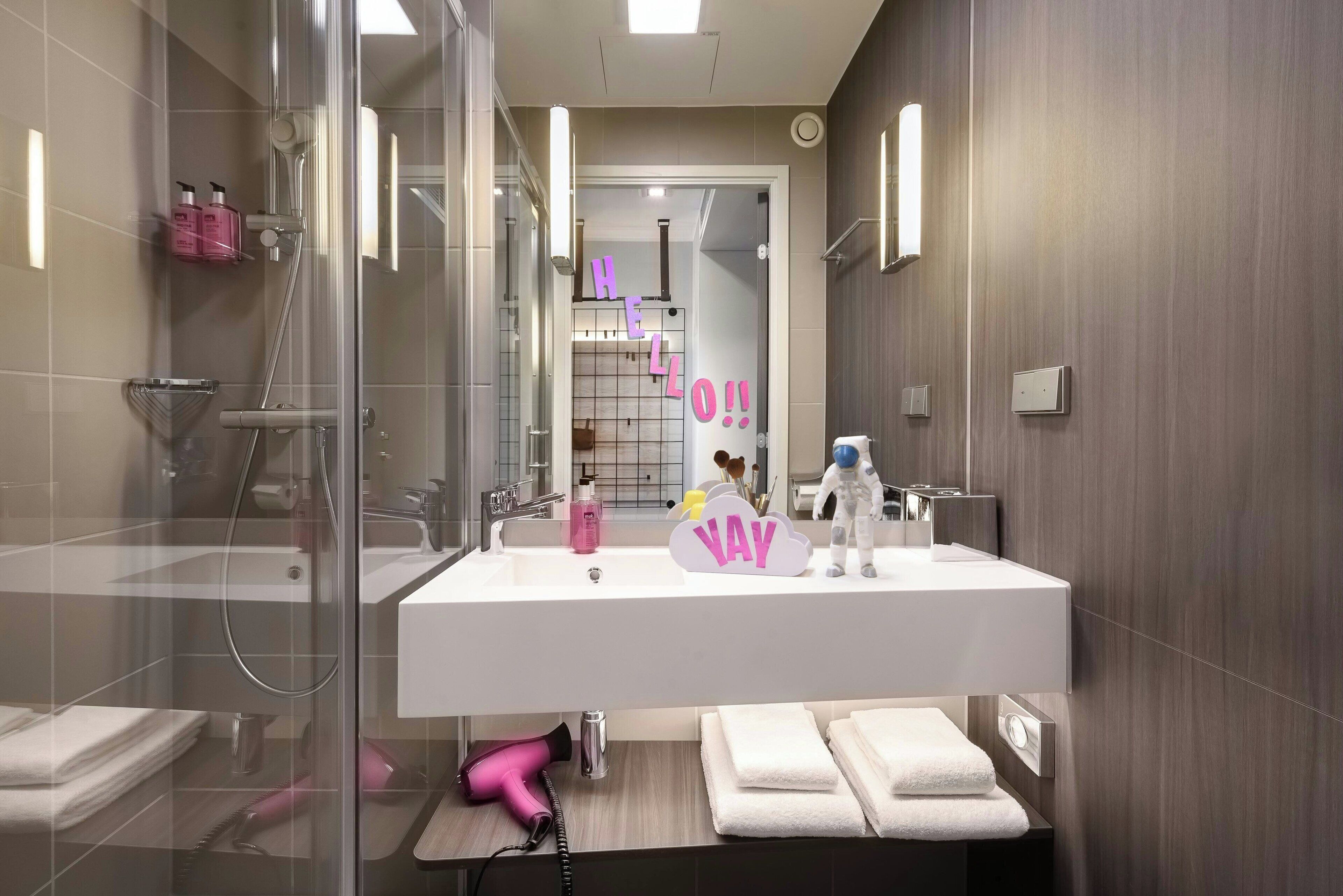 premium bedding, down duvets, desk, blackout curtains