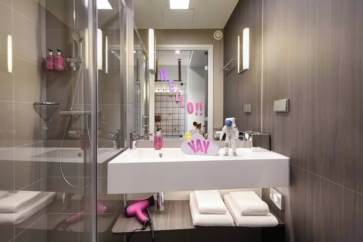 premium bedding, down duvets, desk, blackout curtains