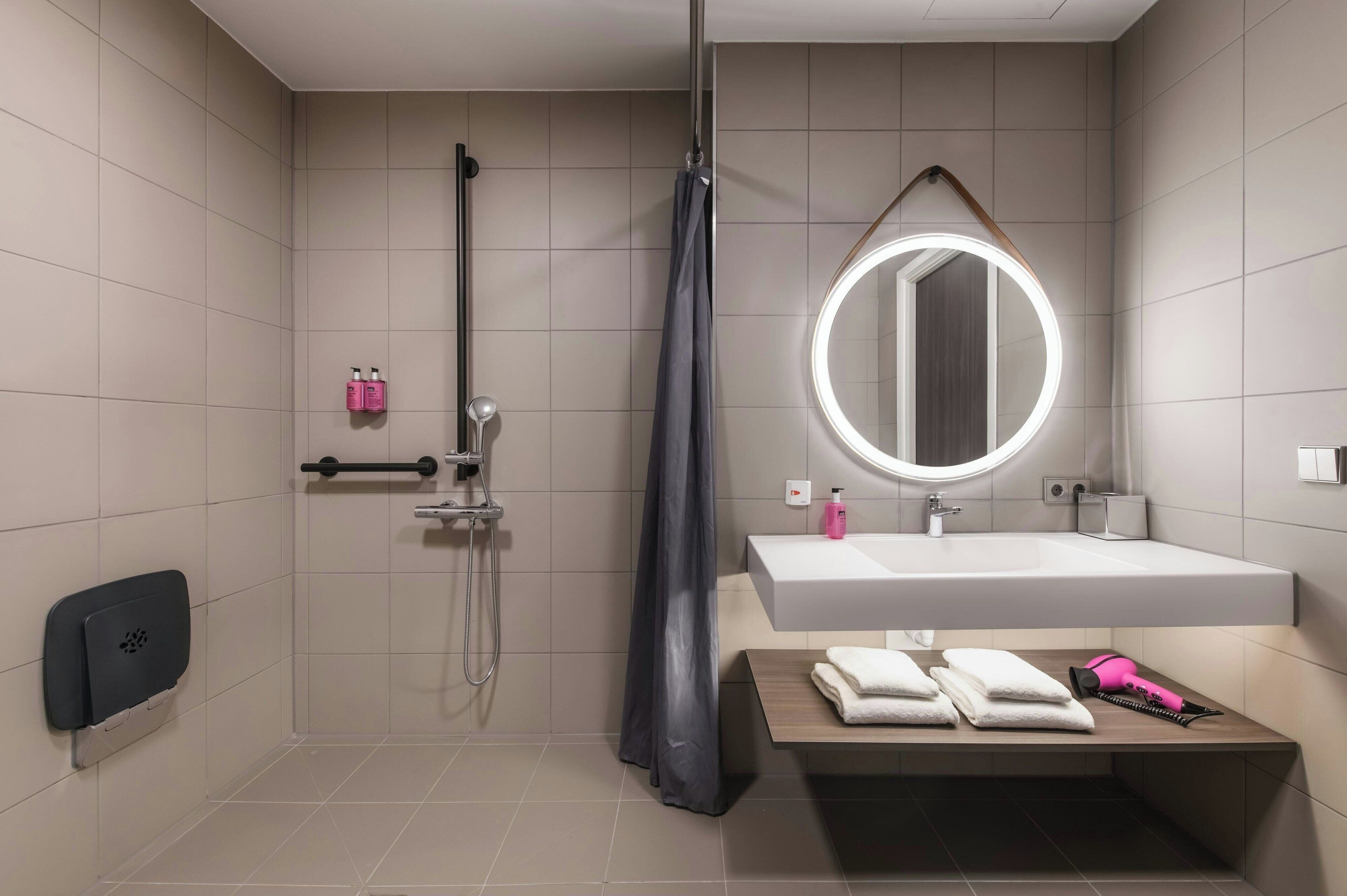 shower, free toiletries, hair dryer, towels