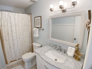 Bathtub, hair dryer, towels