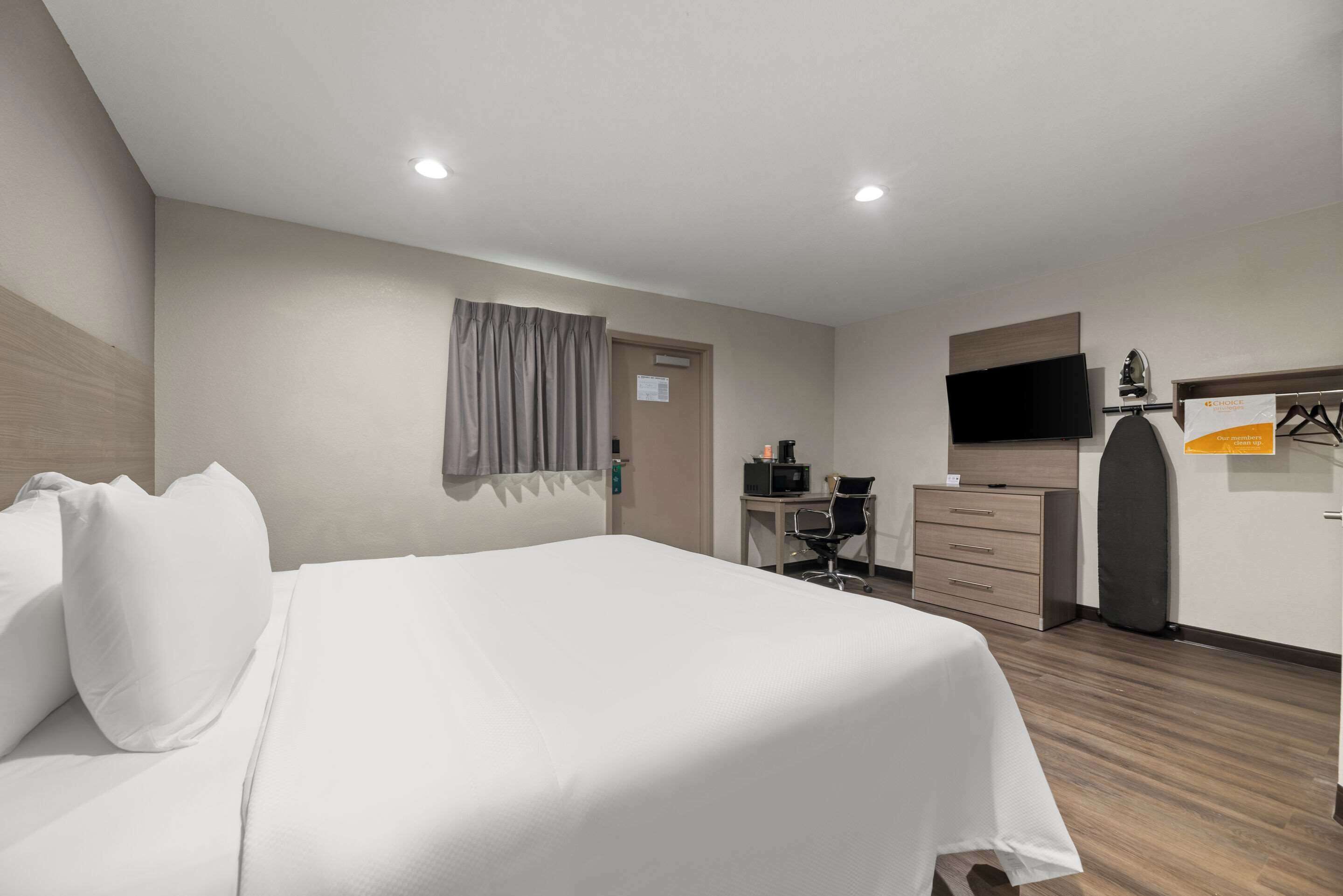 1 bedroom, desk, blackout curtains, iron/ironing board