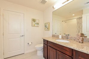 Combined shower/tub, hair dryer, towels, soap