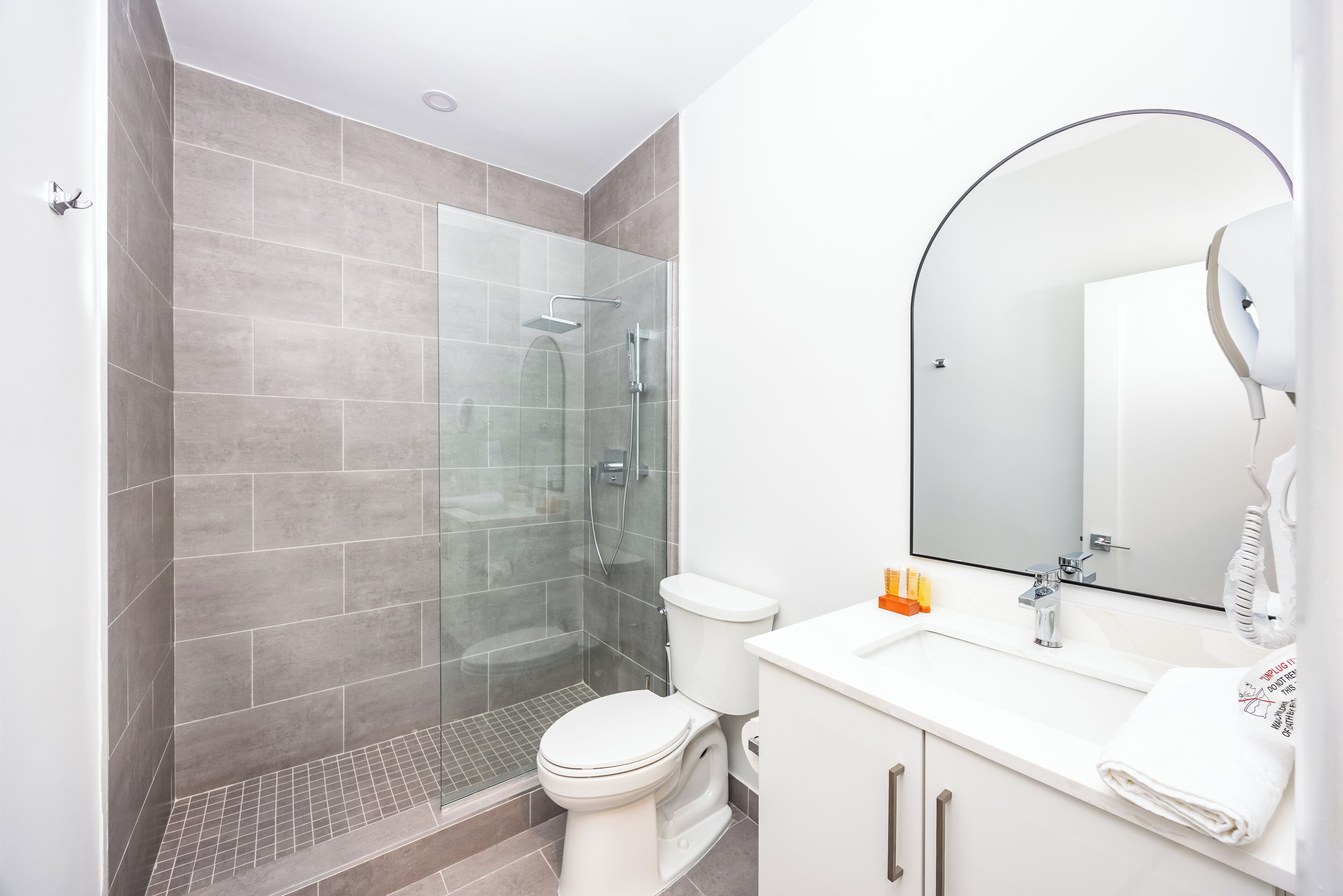 shower, free toiletries, hair dryer, towels