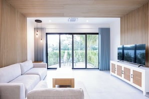 55-inch TV with cable channels, Netflix, Hulu