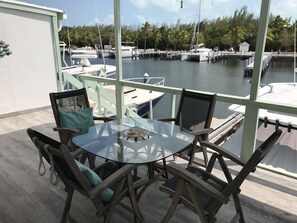 Outdoor dining - Beautifully remodeled  “Over the water” Townhouse suite! (Berry Islands)