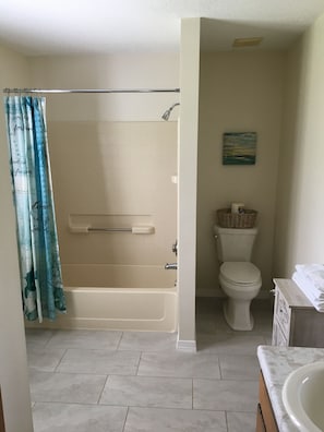 Combined shower/tub, hair dryer, towels, toilet paper