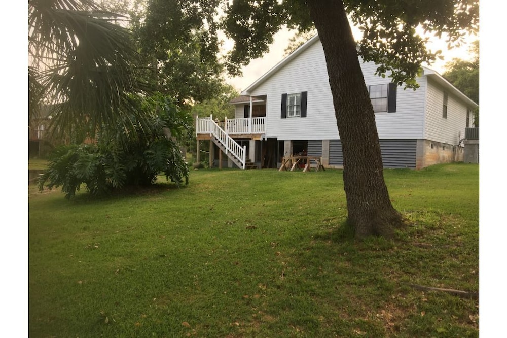 Home just off East Fowl River on deep water canal