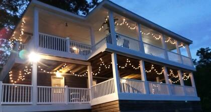 What a view of our beautiful Lake Jordan. This cabin is sure to charm you .