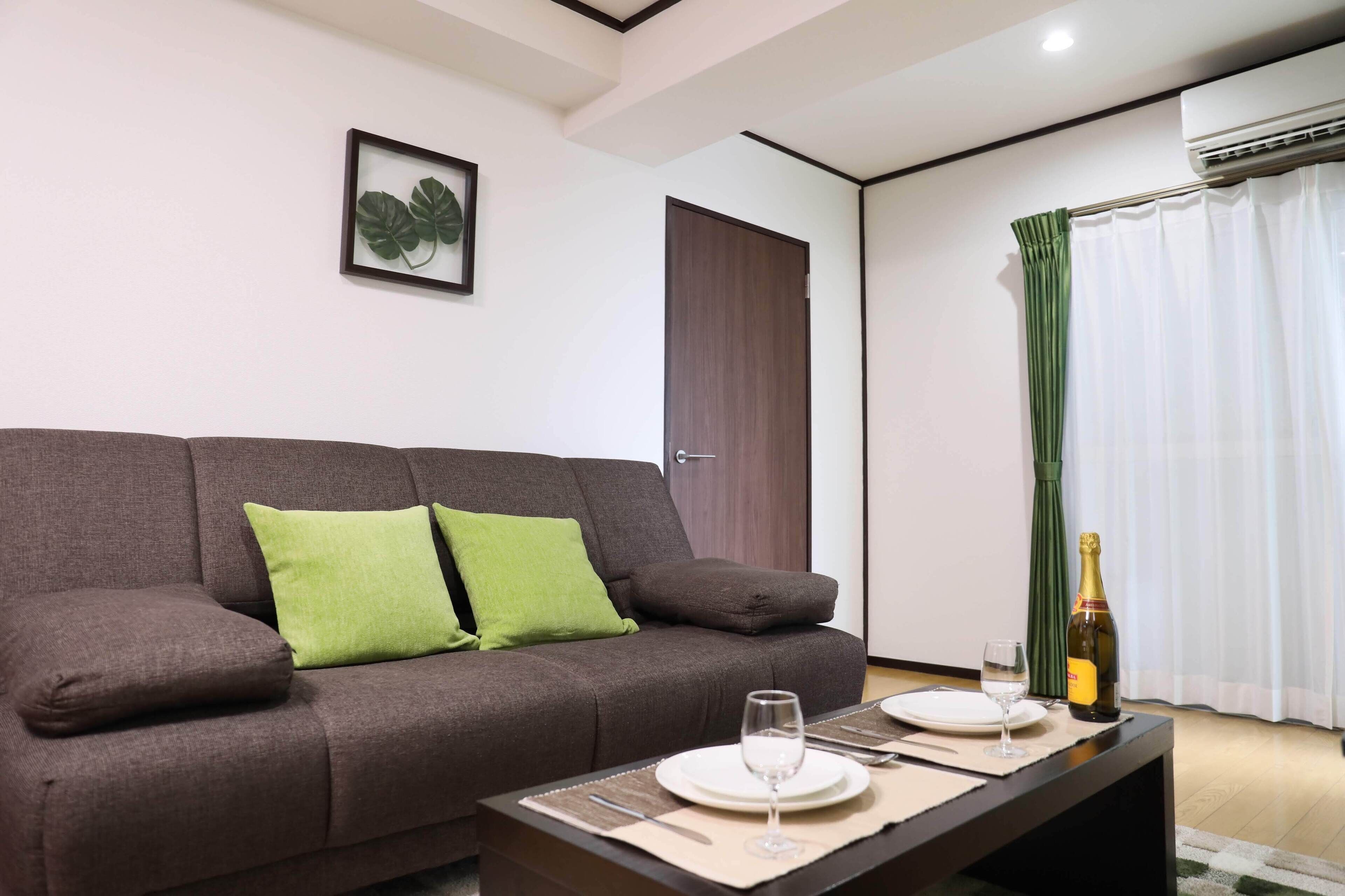 Apartment, Non Smoking (401) | Living area | 40-inch LCD TV with digital channels, TV