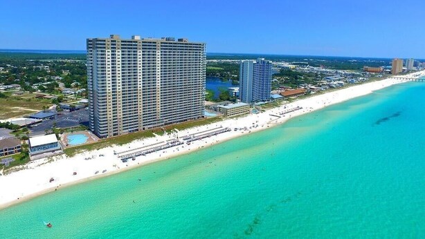 A high-rise hotel with a beach view, a pool, and a long beachfront. - *Sept 6- 8th/Labor Day Open!* Beach chairs included! (Panama City Beach)