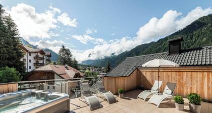 Appartement de vacances "Ăn Residenz Bun StĂ©" avec vue sur la montagne, jacuzzi, sauna & jardin