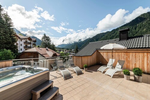 Ferienwohnung "Ön Residenz Bun Sté" mit Bergblick, Sauna & Garten