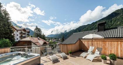Ferienwohnung "Ön Residenz Bun Sté" mit Bergblick, Sauna & Garten