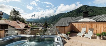 Apartment "Cater Residence Bun Sté" with Mountain View, Whirlpool, Sauna & Garden