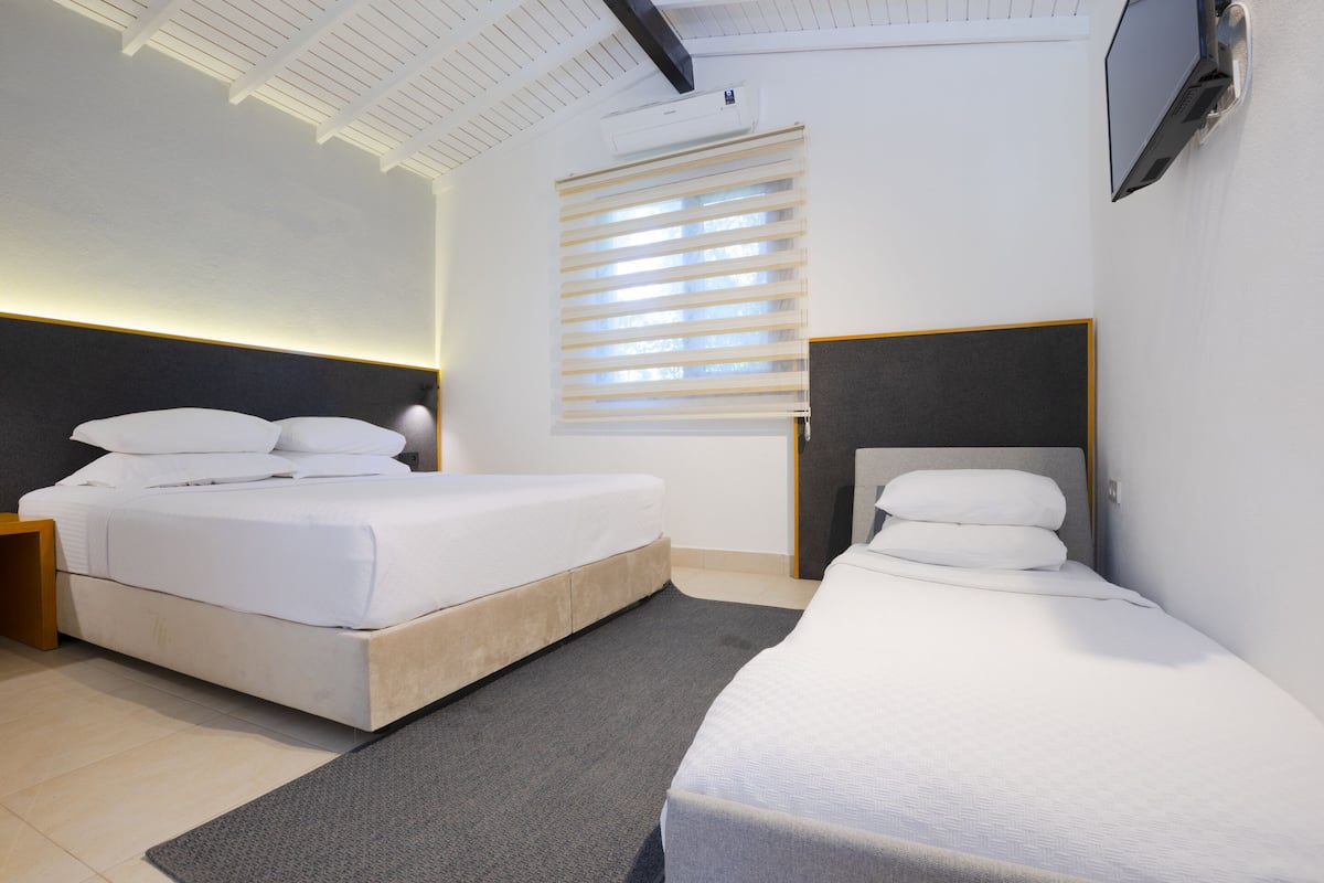 Bungalow Comfort, bagno privato, vista giardino (Bungalow with Kitchen) | Minibar, tende oscuranti, insonorizzazione, ferro/asse da stiro