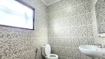 Superior Double | Bathroom | Shower, rainfall showerhead, towels, soap