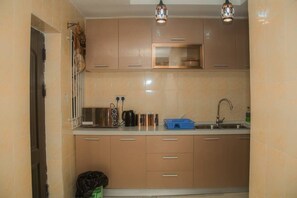 Casa, várias camas | Cozinha privada | Geladeira, micro-ondas, fogão, cooktop