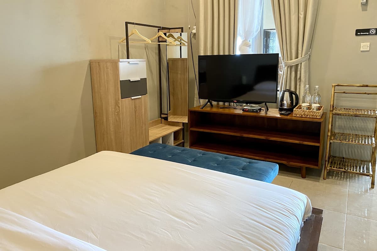 Habitación Deluxe | Escritorio, wifi gratis, ropa de cama