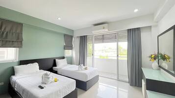 Habitació amb dos llits individuals superior | Wifi gratuïta i roba de llit