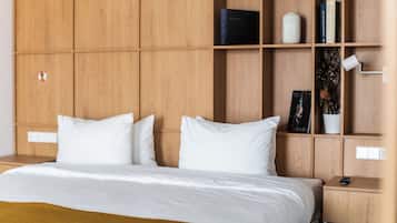 Ropa de cama de alta calidad, minibar y escritorio