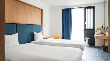 Quarto duplo | Roupas de cama premium, frigobar, escrivaninha