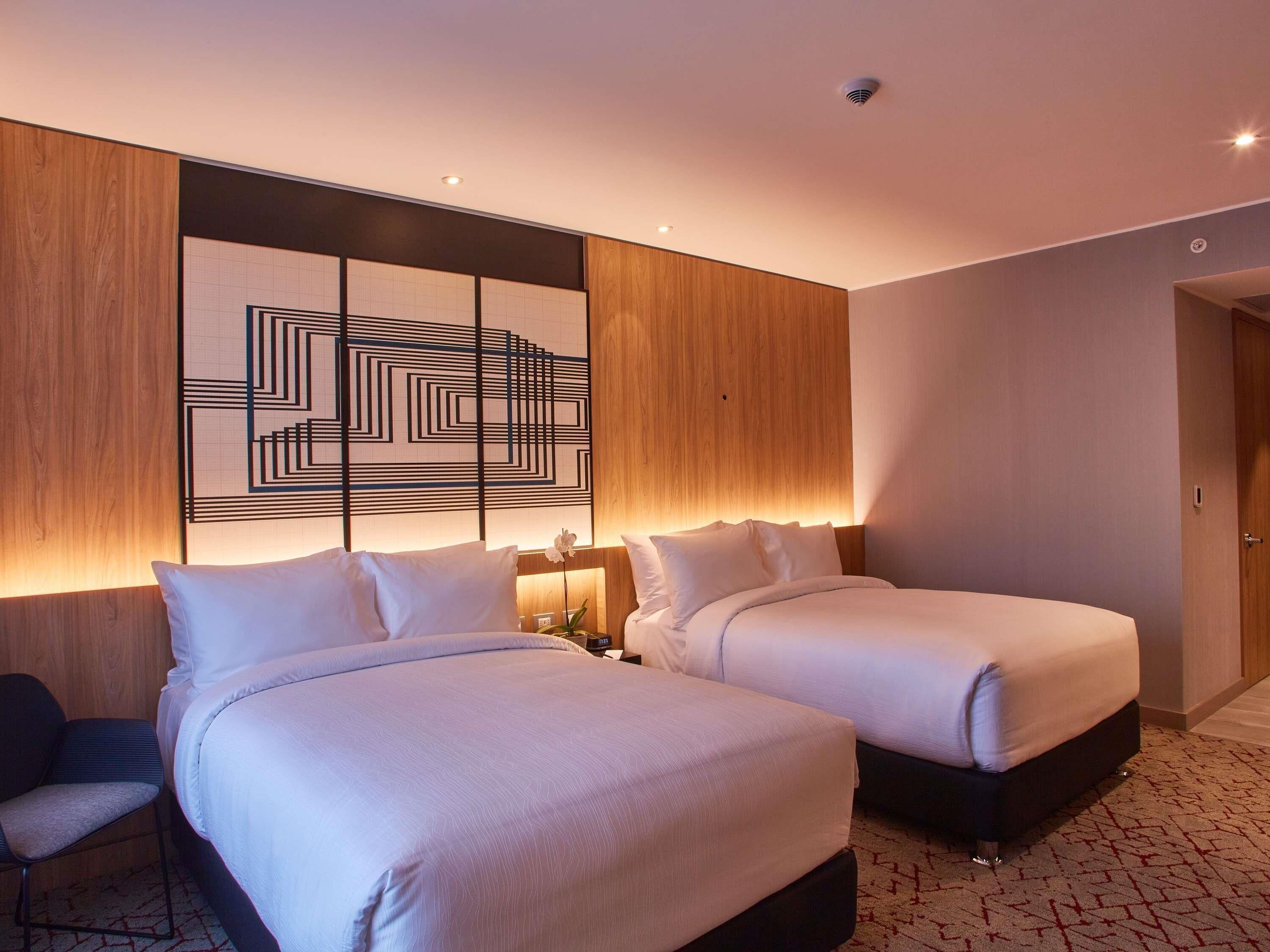 Hypo-allergenic bedding, minibar, in-room safe, desk