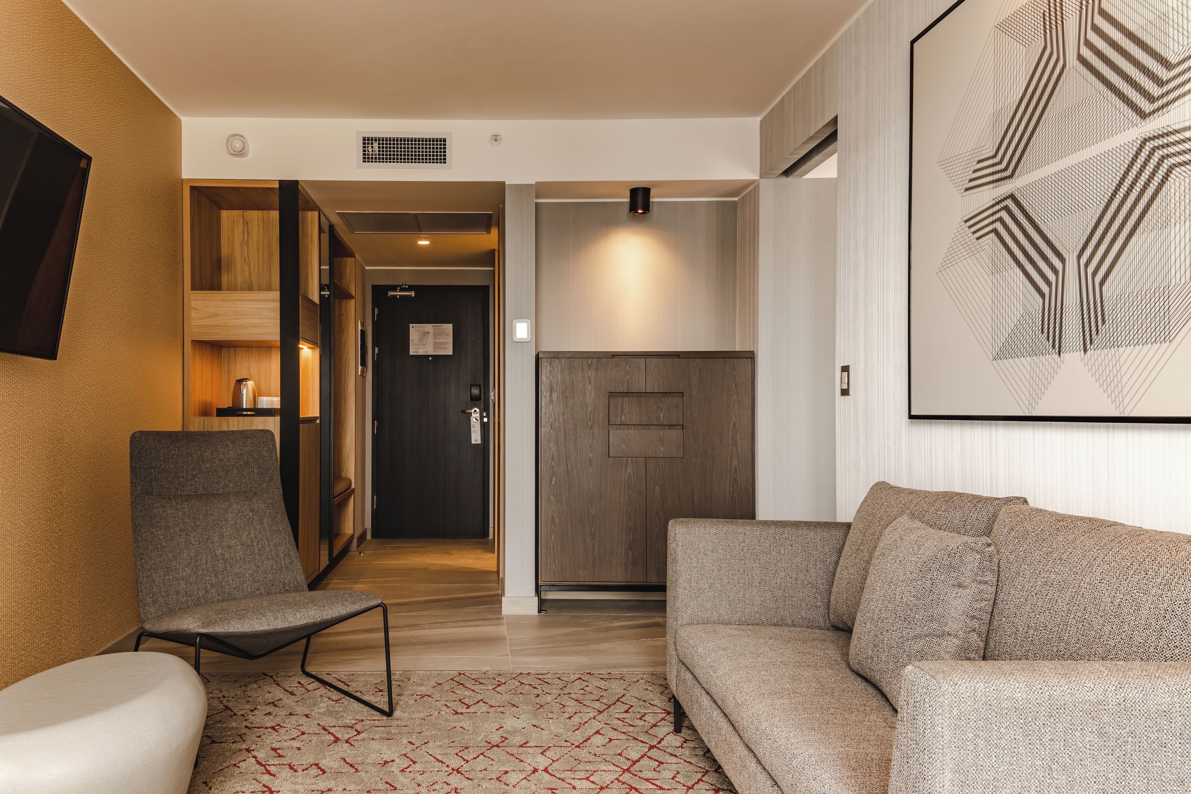 executive suite, 1 king bed, club lounge access | living area | 50-inch led tv with cable channels, tv, ipod dock