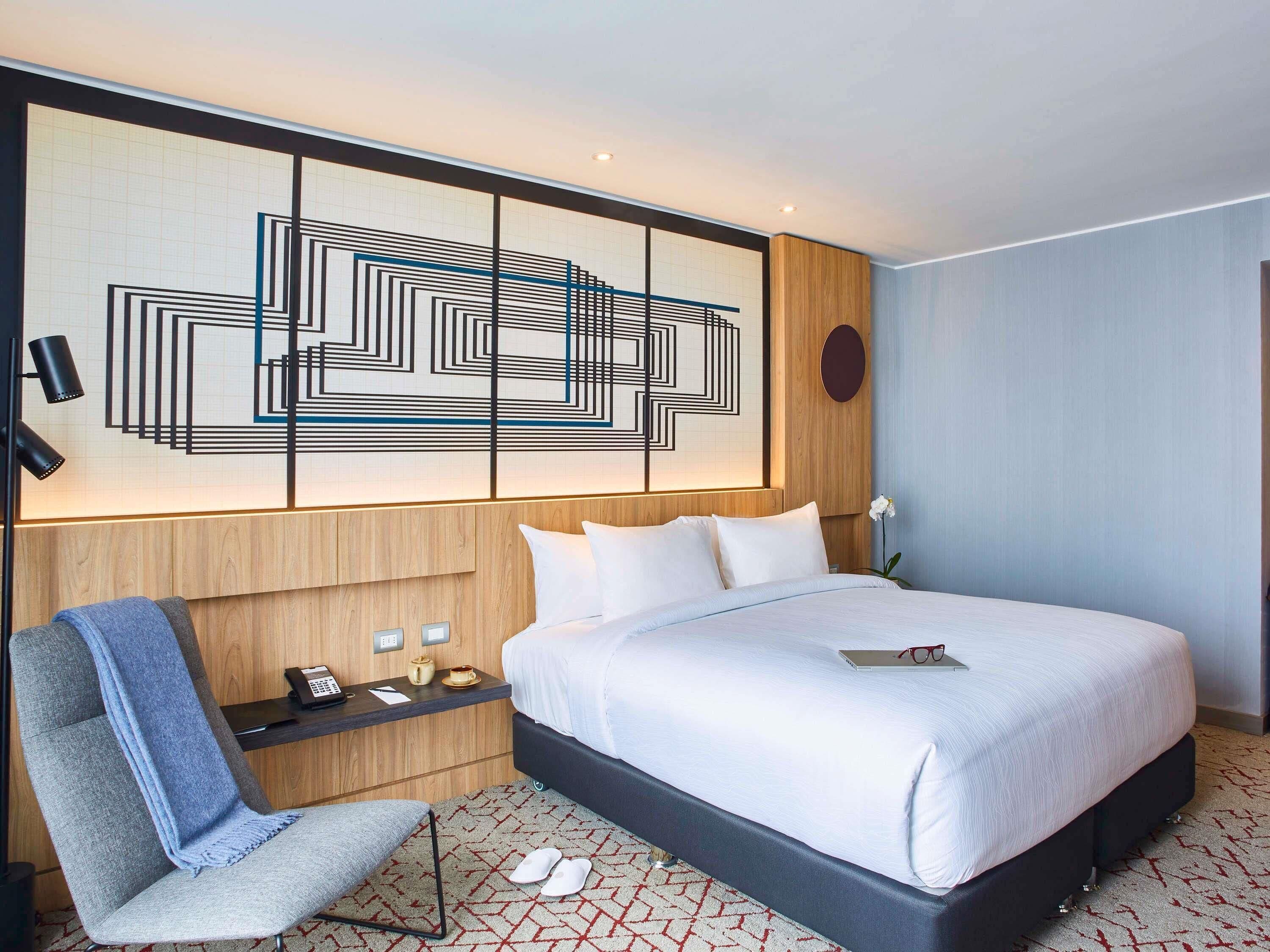 Hypo-allergenic bedding, minibar, in-room safe, desk