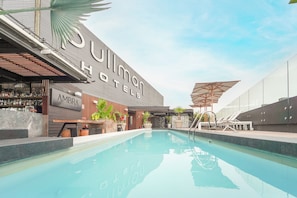 Outdoor pool, sun loungers
