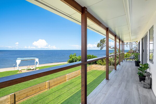 Balcony - Absolute Beachfront Holiday House (Beachmere)