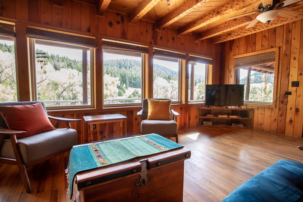 2 bedroom Cabin on 6 acres tucked up Taos Canyon.