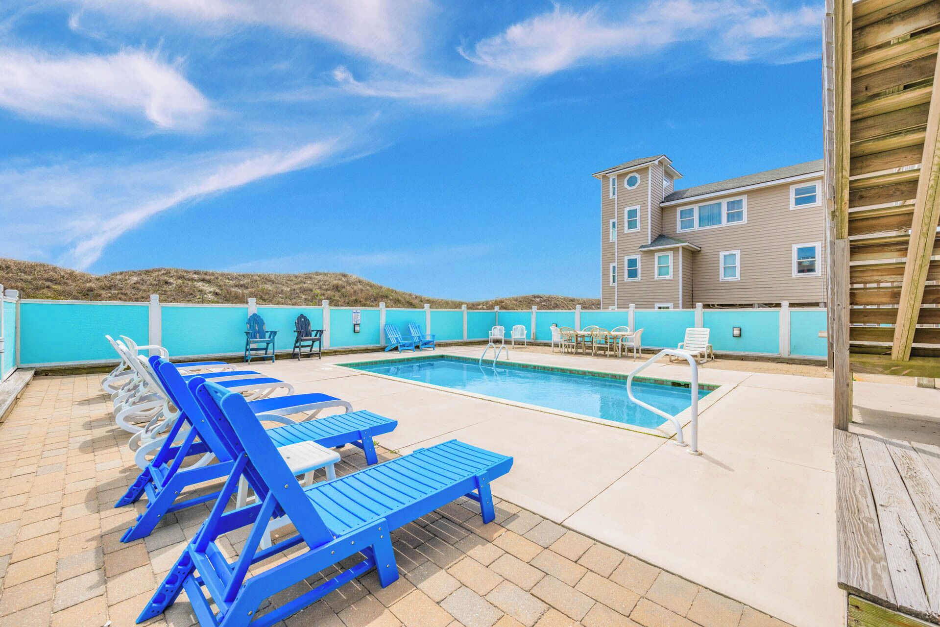 Outdoor pool, a heated pool, pool loungers