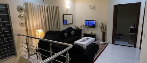 Ferienhaus | Wohnzimmer | 30-Zoll-Fernseher mit Digitalempfang