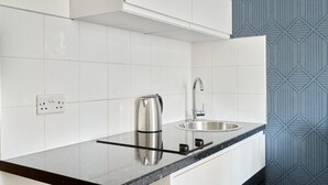 Unclassified image, 2 of 11, button - Plum Guide - Pomegranate Tonic (London)