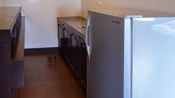 Family Studio | Living area | 32-inch flat-screen TV with cable channels, TV