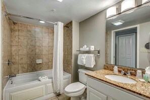 Shower, jetted bath, towels