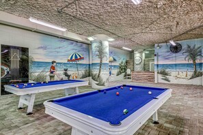 Enjoy pool games and beach-themed murals in our Activity Center.