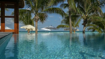 Outdoor pool, open 9:00 AM to 7:00 PM, sun loungers