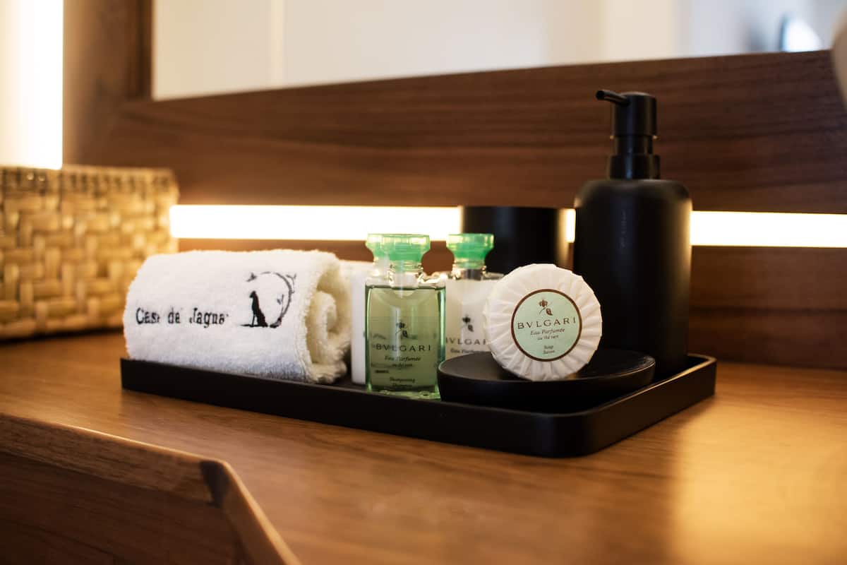 junior suite | bathroom | shower, rainfall showerhead, designer toiletries, hair dryer