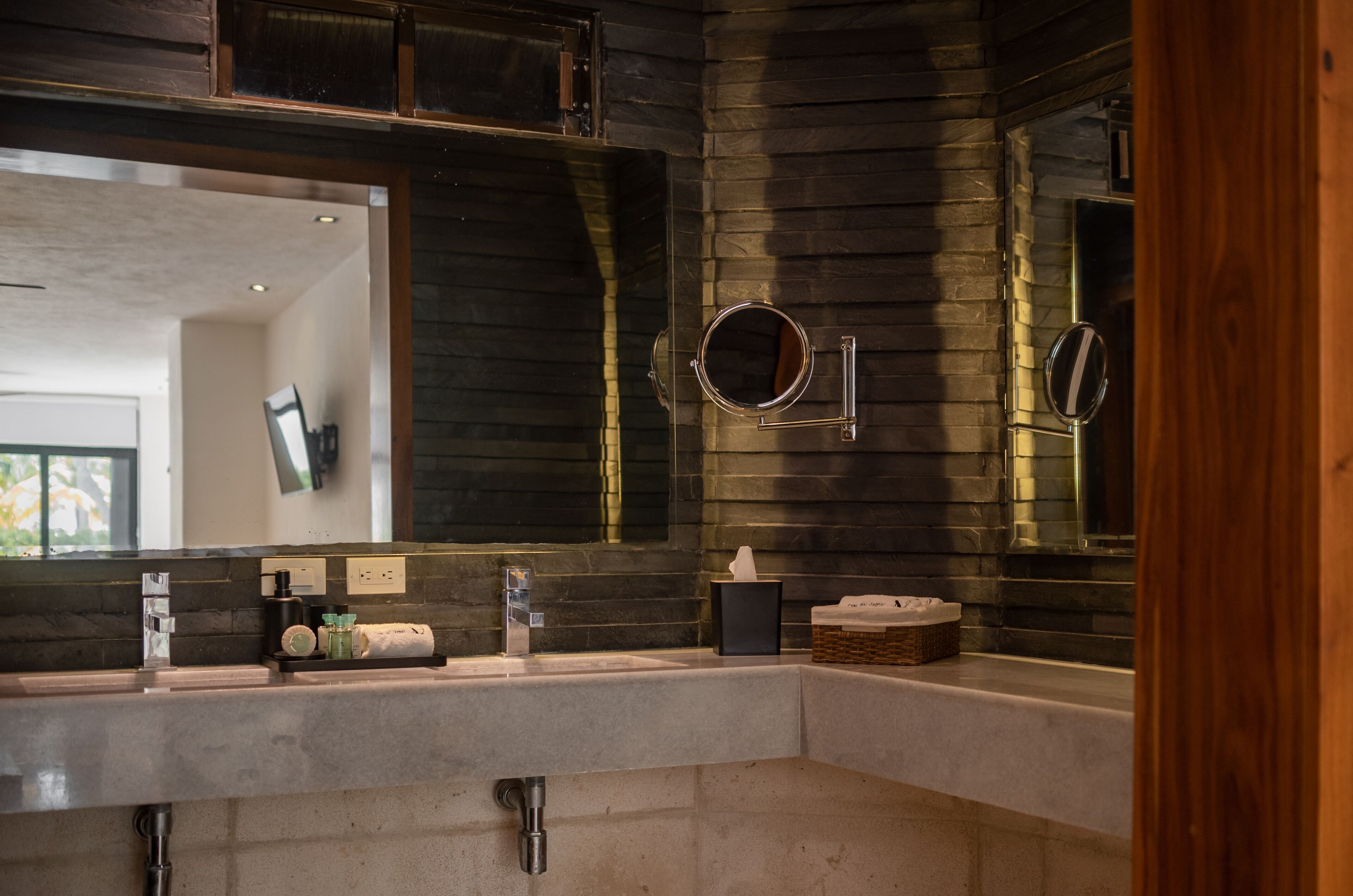 deluxe suite | bathroom | shower, rainfall showerhead, designer toiletries, hair dryer