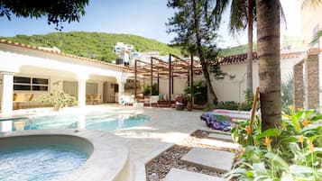 Outdoor pool, sun loungers