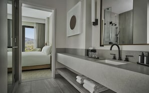 Hydromassage showerhead, designer toiletries, hair dryer, bathrobes
