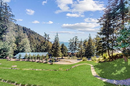 Property grounds. Wonderful escape with water access, three balconies, W/D, & gas fireplace