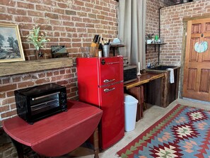 Fridge, microwave, coffee/tea maker, toaster