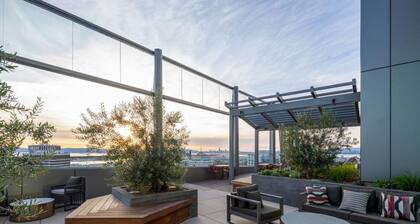 Epic Oakland 2BR w/ AC, W/D, Sky Deck, next to BART, by Blueground