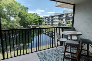 Outdoor dining - Park Shore Resort-newly renovated 2nd flr-master suite w/direct lanai access-incredible water views (Naples)