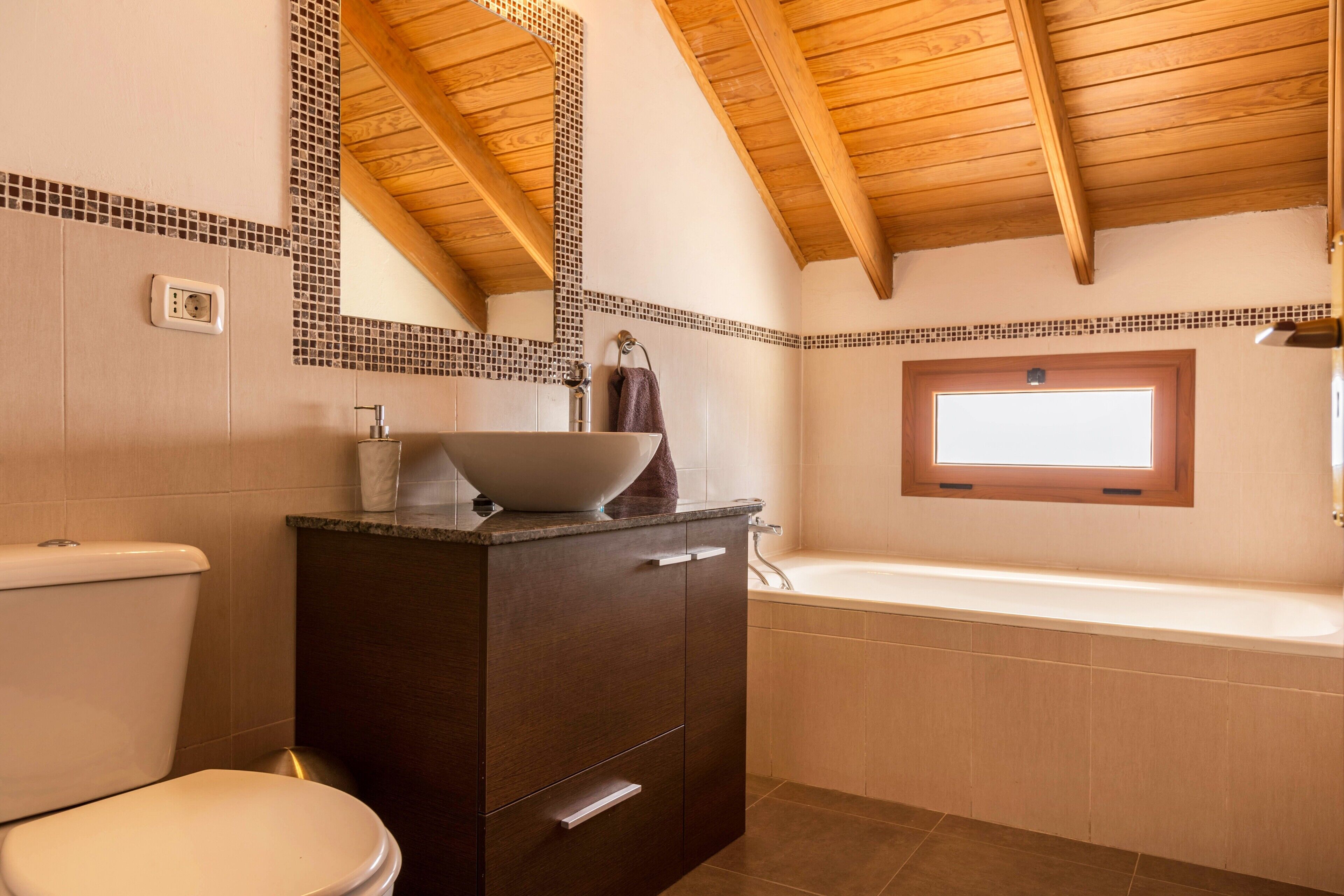 Bathtub, hair dryer, towels